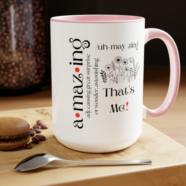 image of amazing mug with pink handle and pink interior set on a table with a cookie