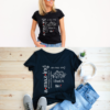 Amazing T shirt modeled in black and displayed with jeans and grey shoes as an outfit